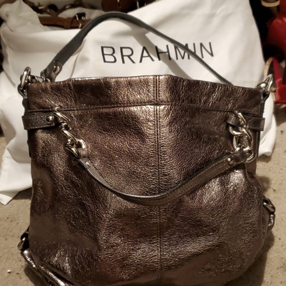 Metallic silver coach purse